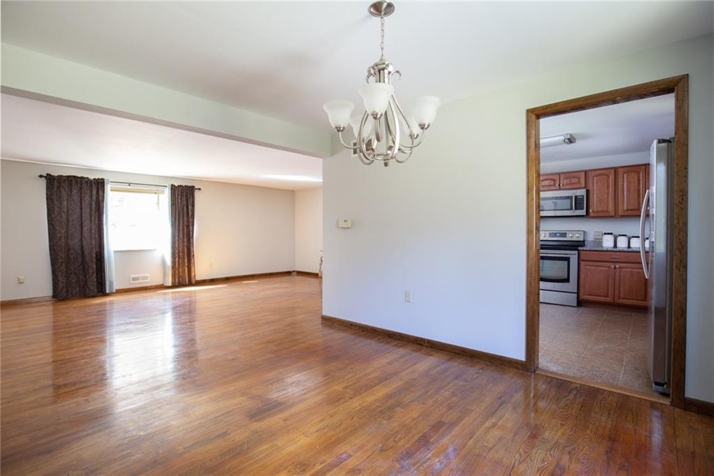 1433 Beulah Road Pittsburgh, PA 15235 - Photo 8 of 22 Dining Room/Living Room/Kitchen