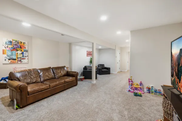 a utility room with sink dryer and washer