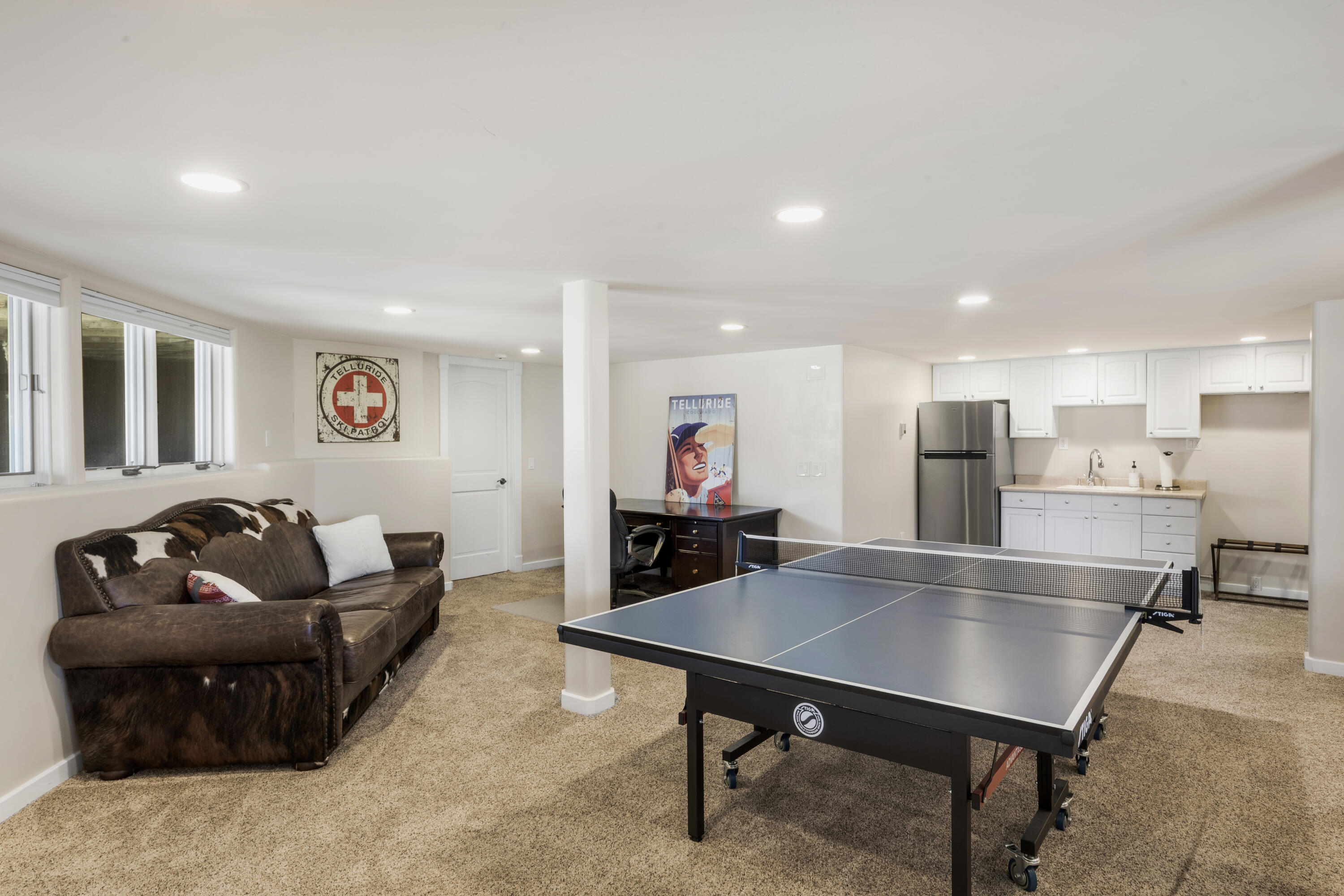 119 Touchdown Drive Mountain Village, CO 81435 - Photo 29 of 31 a living room with furniture kitchen view and a table