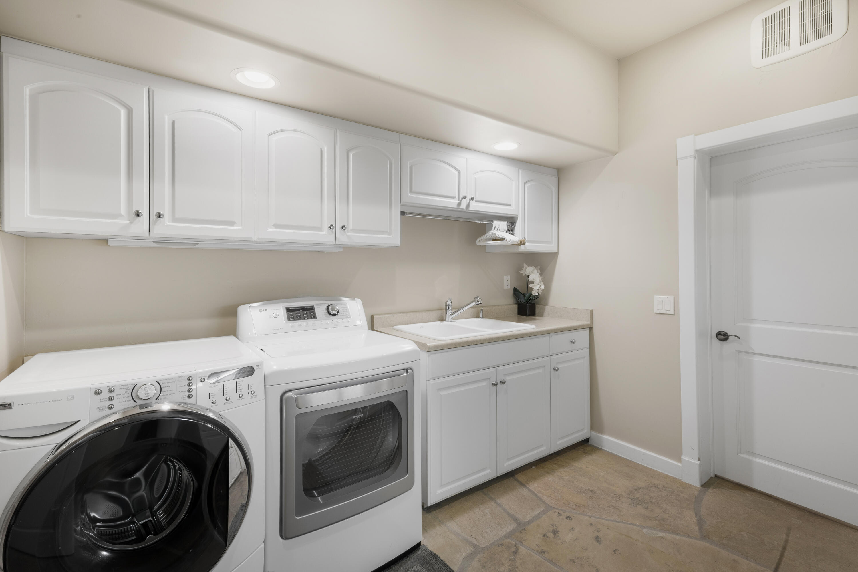 119 Touchdown Drive Mountain Village, CO 81435 - Photo 31 of 31 a utility room with sink dryer and washer