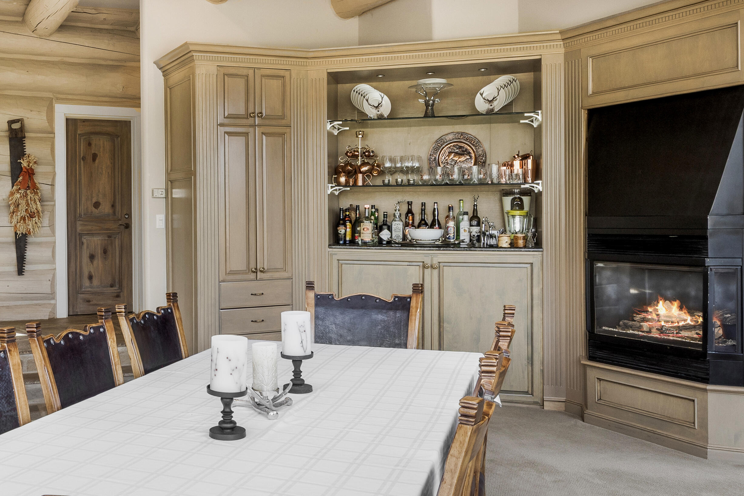 119 Touchdown Drive Mountain Village, CO 81435 - Photo 9 of 31 a dining room with furniture and chandelier