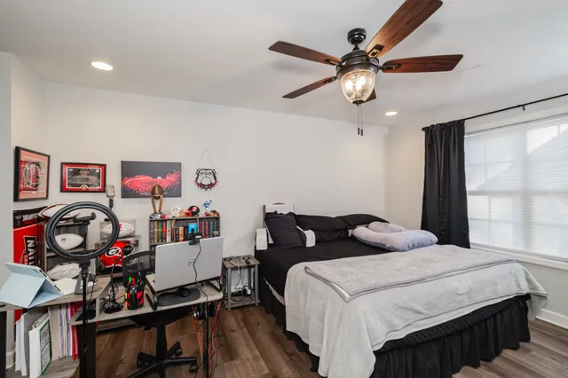 a bedroom with furniture and a bed