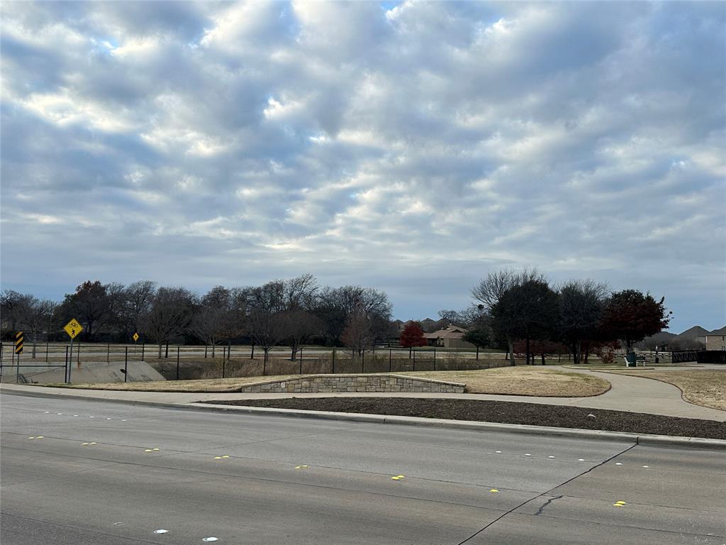 5908 Holiday Lane, Unit C North Richland Hills, TX 76180 - Photo 16 of 18 a view of a yard