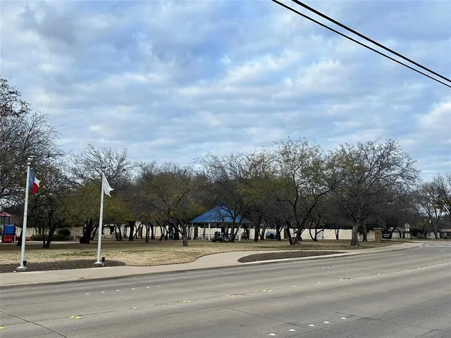 a view of a house with truck parked