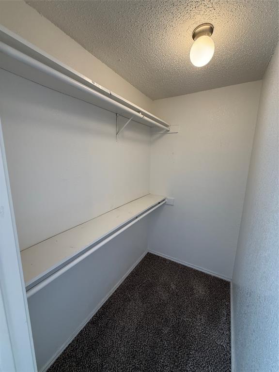 5908 Holiday Lane, Unit C North Richland Hills, TX 76180 - Photo 9 of 18 a view of small space with racks on the wall