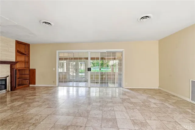 a view of an empty room with window