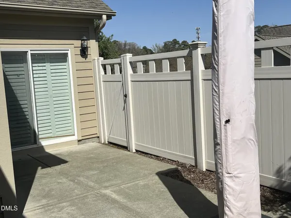 a view of a house with a door and a window