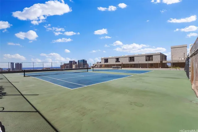 a view of an outdoor space and tennis court