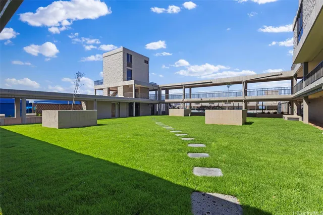 a view of an outdoor space and tennis court