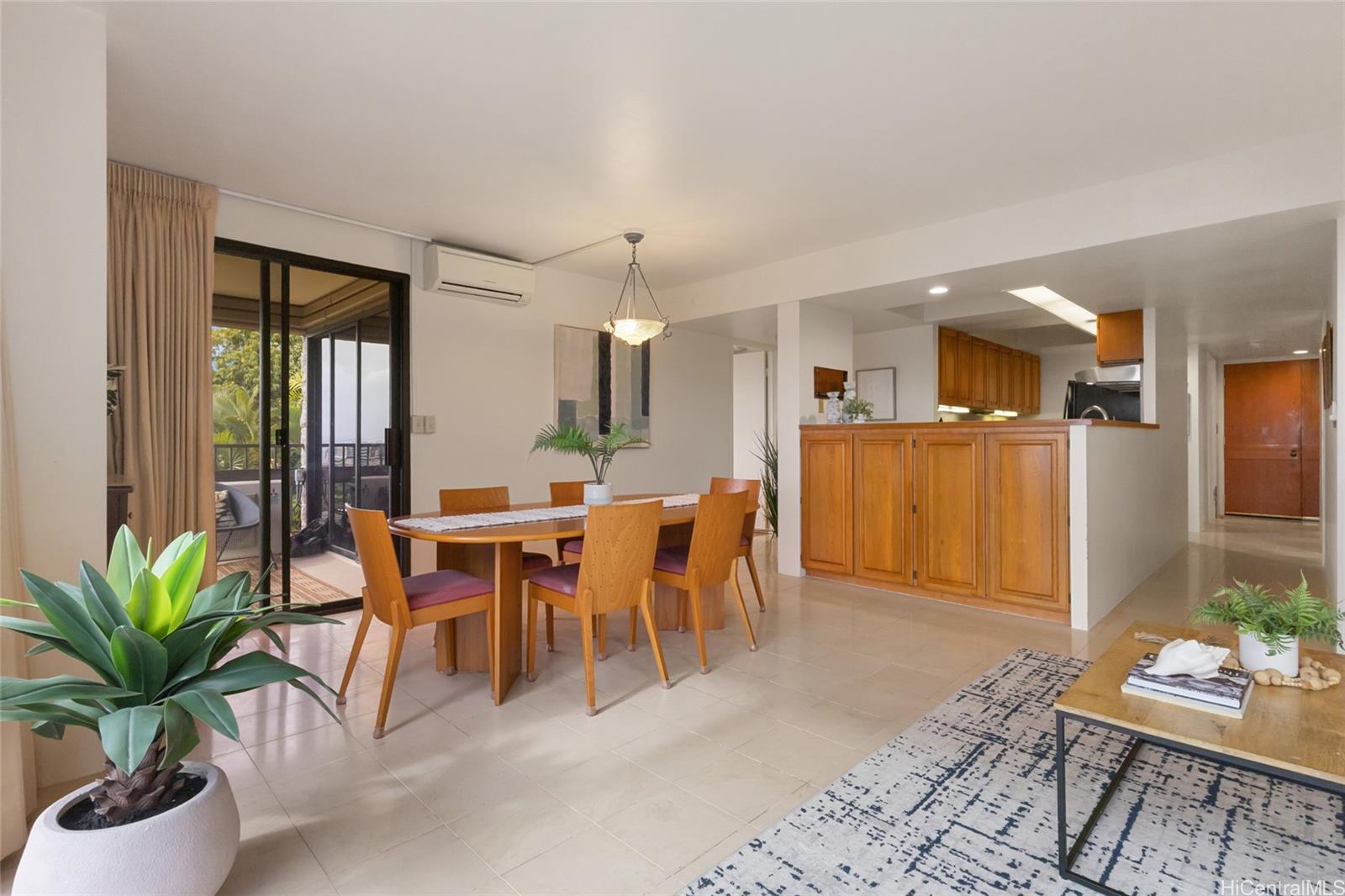 217 Prospect Street, Unit D11 Honolulu, HI 96813 - Photo 5 of 24 a dining room with furniture and wooden floor