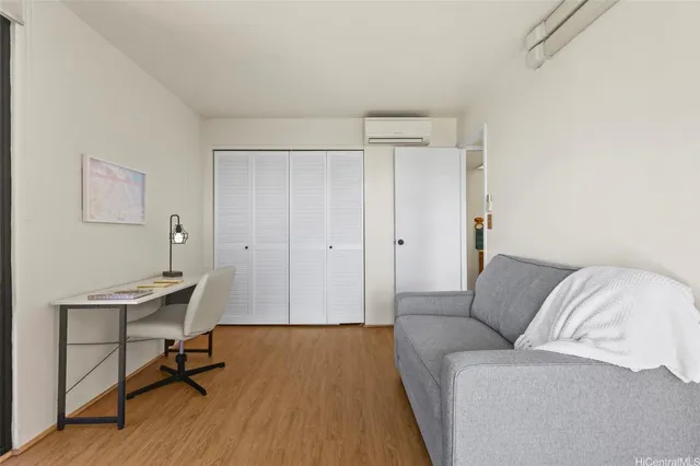 a view of a livingroom with furniture and wooden floor
