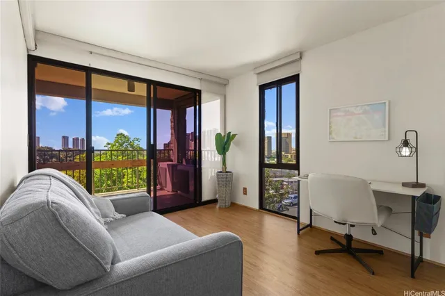 a living room with furniture and a window