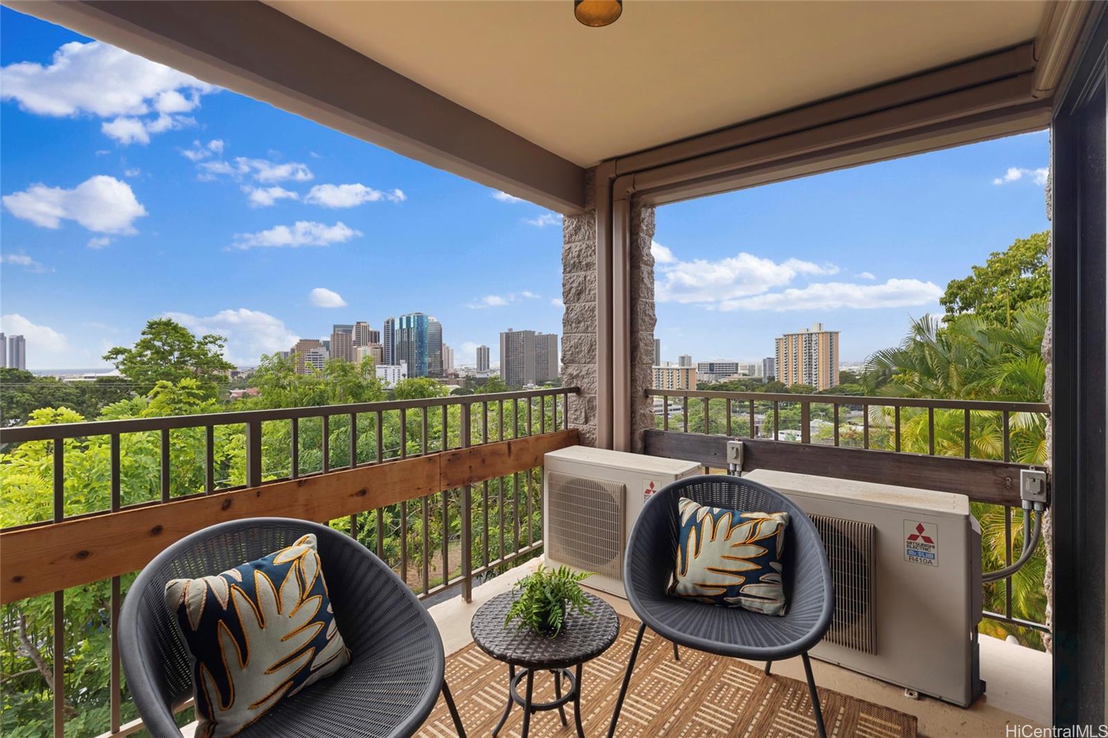 217 Prospect Street, Unit D11 Honolulu, HI 96813 - Photo 10 of 24 a view of a chair and tables in the balcony