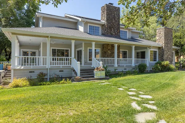 front view of a house with a yard