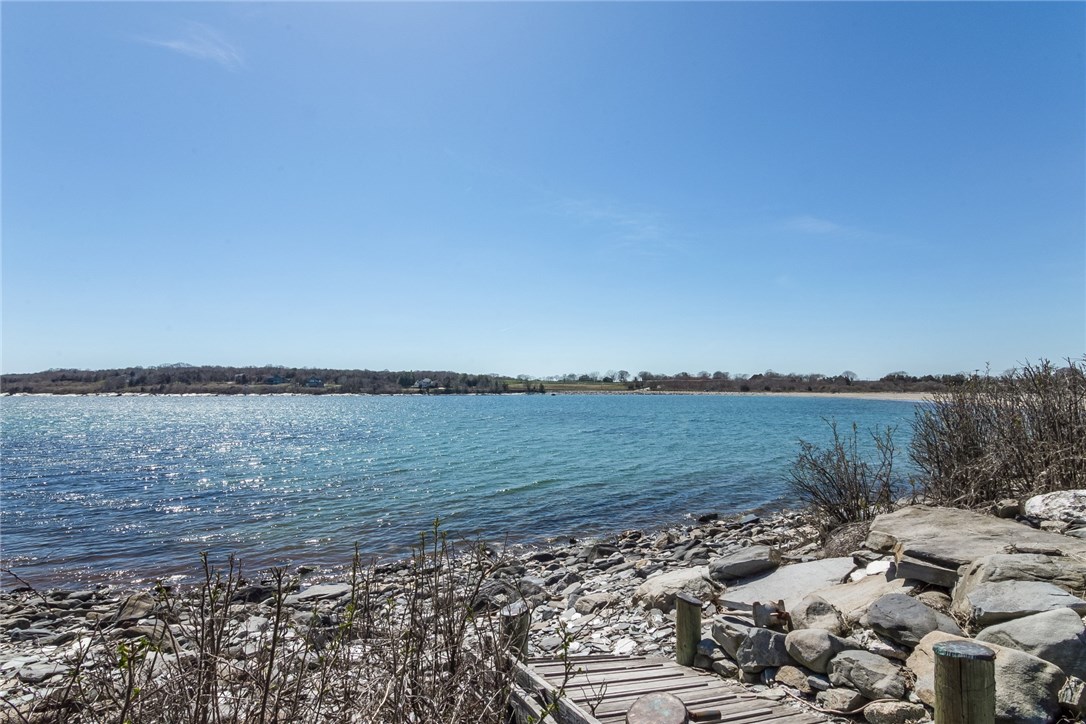 7 Beavertail Road Jamestown, RI 02835 - Photo 9 of 37 A walkway to Mackerel Cove, which has a roped off swim area and is lifeguarded in the summer season, allows easy access for swimming, paddleboarding, kayaking or to your moorings