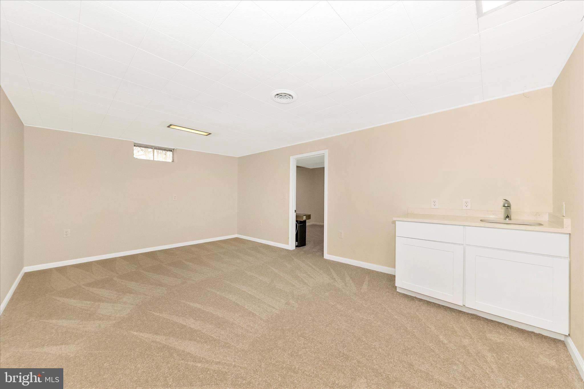 5815 Meadow Road Frederick, MD 21702 - Photo 38 of 55 a view of a kitchen with white cabinets