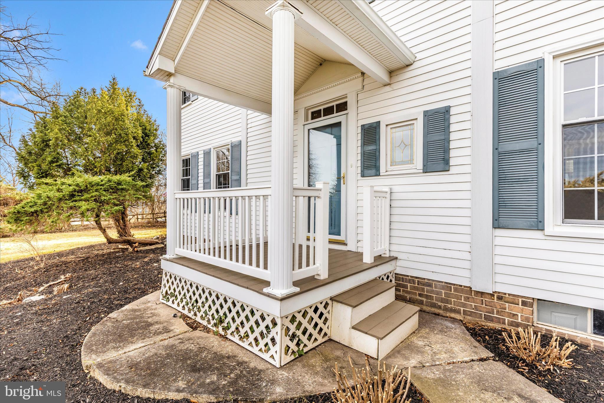 5815 Meadow Road Frederick, MD 21702 - Photo 45 of 55 a view of a house with a wooden deck