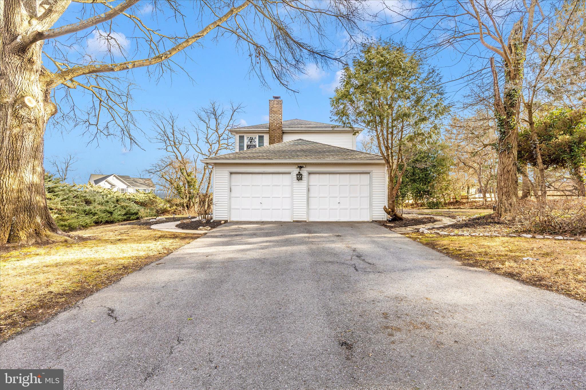 5815 Meadow Road Frederick, MD 21702 - Photo 48 of 55 a view of the house with a yard and garage