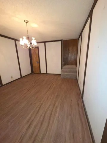 a view of a room with an empty space