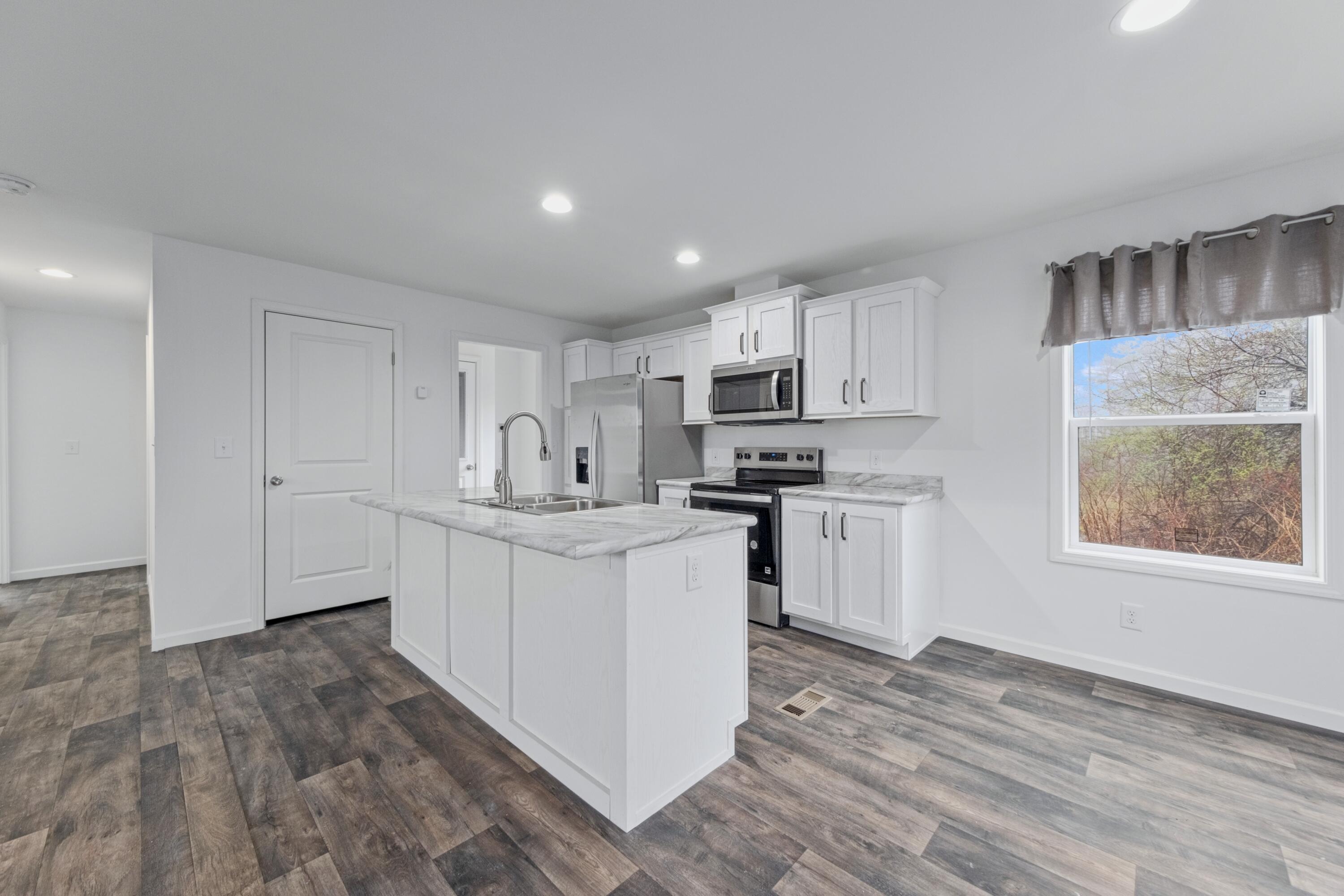 1599 Oyster River Road Warren, ME 04864 - Photo 5 of 19 Kitchen and dining area