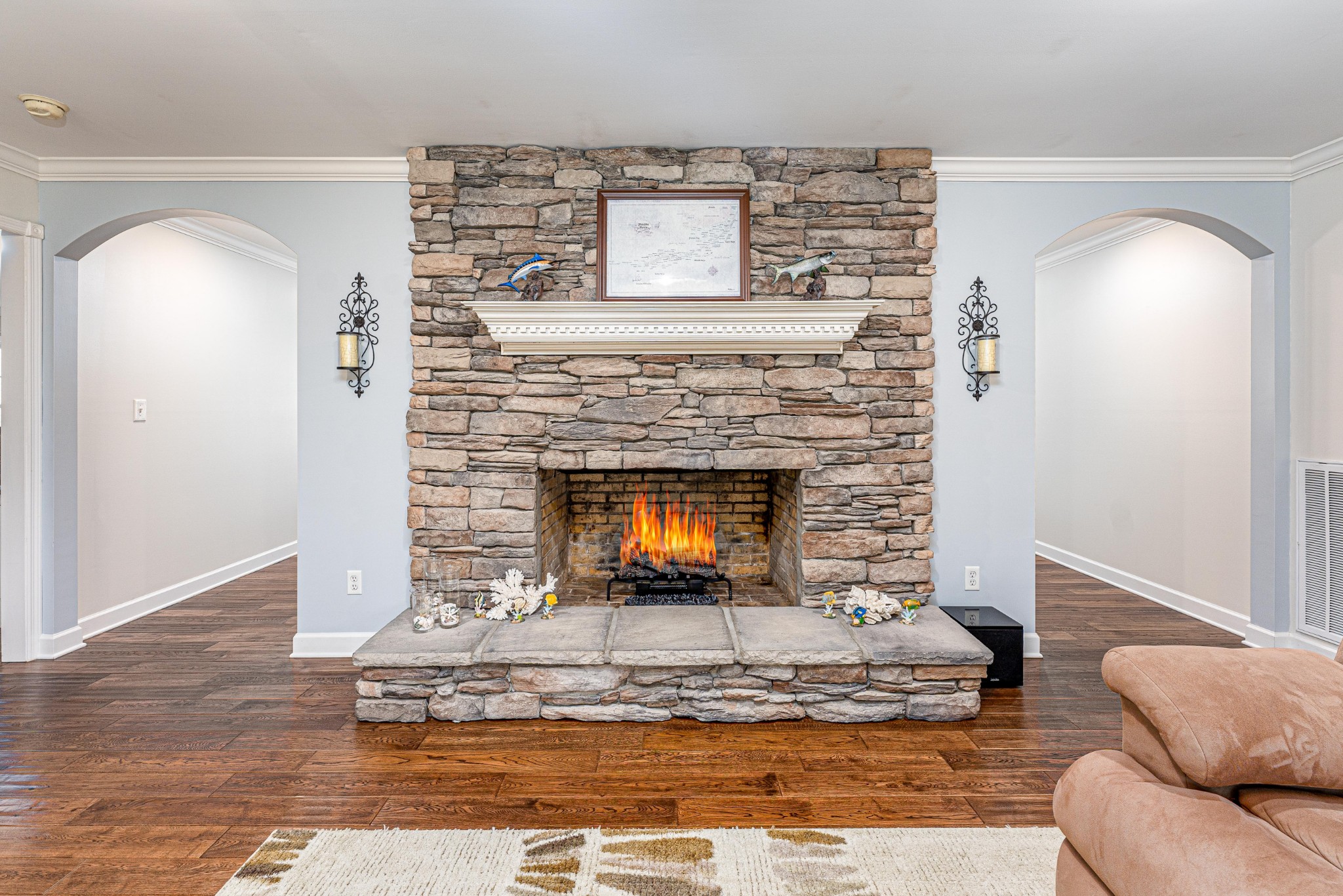 4861 Bethesda Road Thompson's Station, TN 37179 - Photo 12 of 22 a living room with furniture and a fireplace