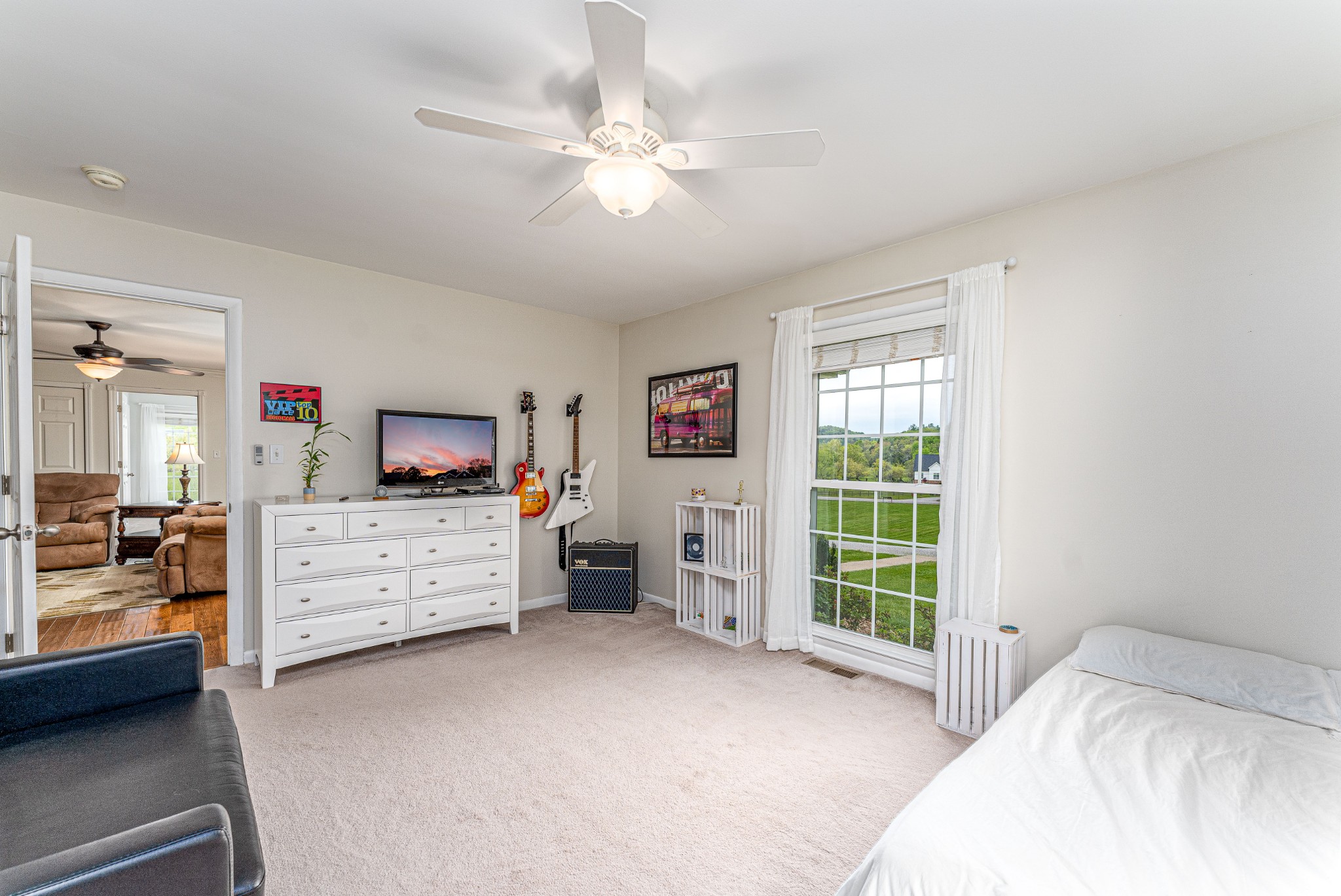 4861 Bethesda Road Thompson's Station, TN 37179 - Photo 18 of 22 a view of a bedroom with workspace and windows
