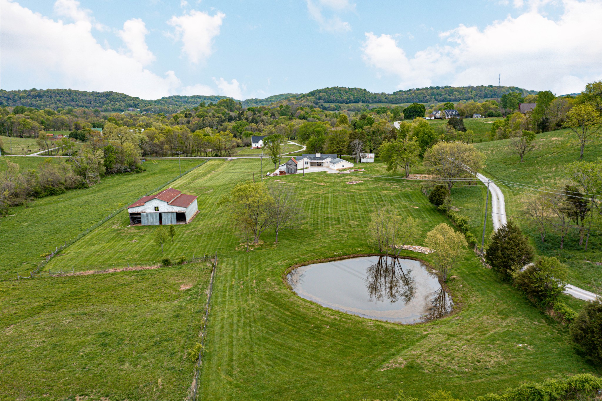 4861 Bethesda Road Thompson's Station, TN 37179 - Photo 3 of 22 a view of a swimming pool with a yard