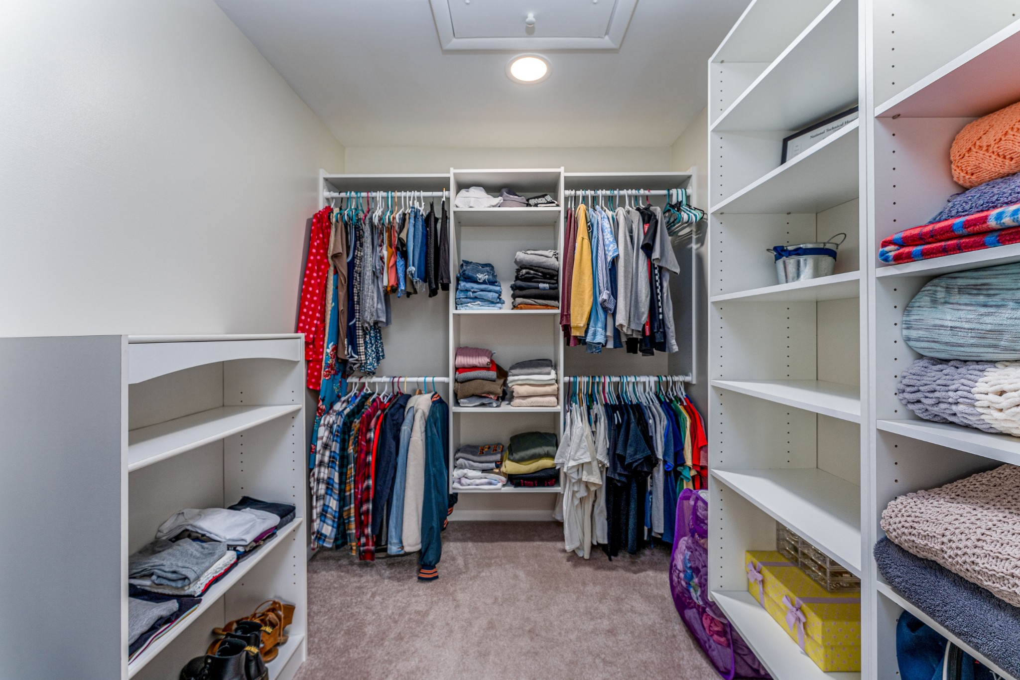 4861 Bethesda Road Thompson's Station, TN 37179 - Photo 21 of 22 a view of walk in closet with clothes and shoes
