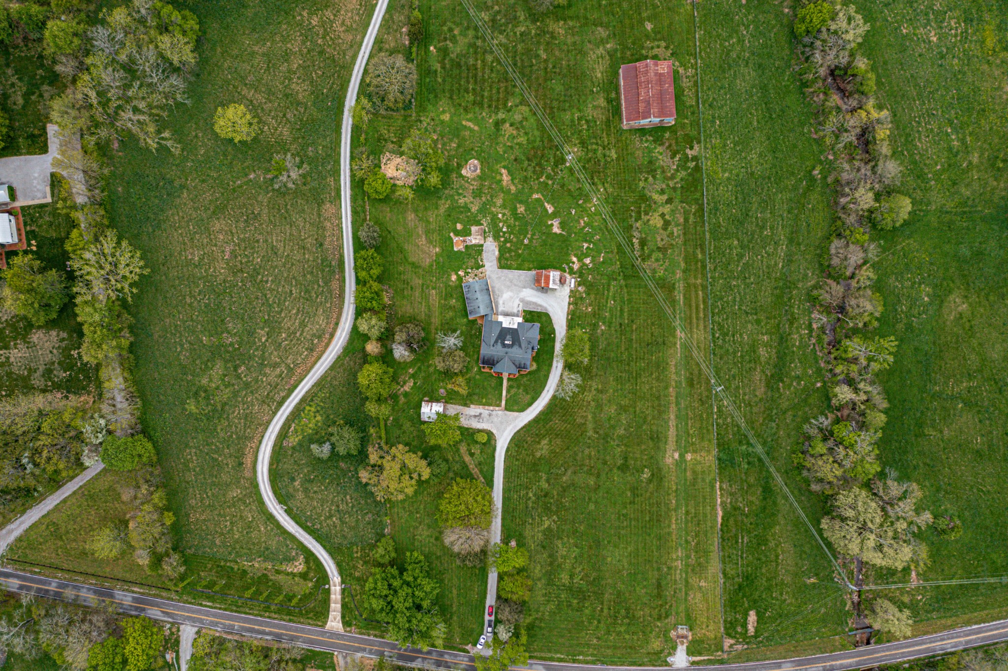 4861 Bethesda Road Thompson's Station, TN 37179 - Photo 4 of 22 an aerial view of a residential houses