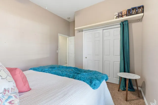 a utility room with sink dryer and washer