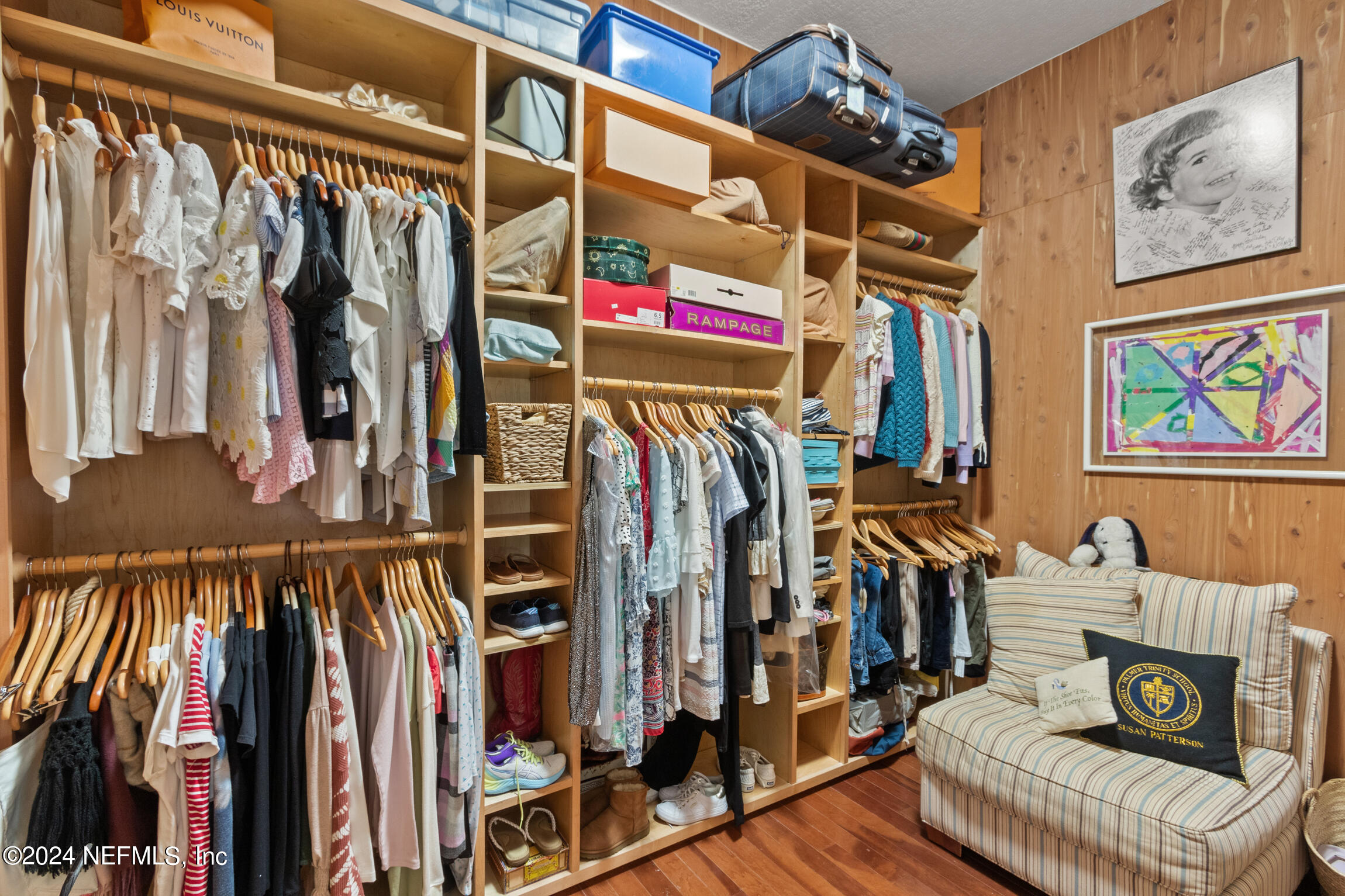 137 South Beach Drive St. Augustine, FL 32084 - Photo 12 of 41 a view of walk in closet with clothes and shoes