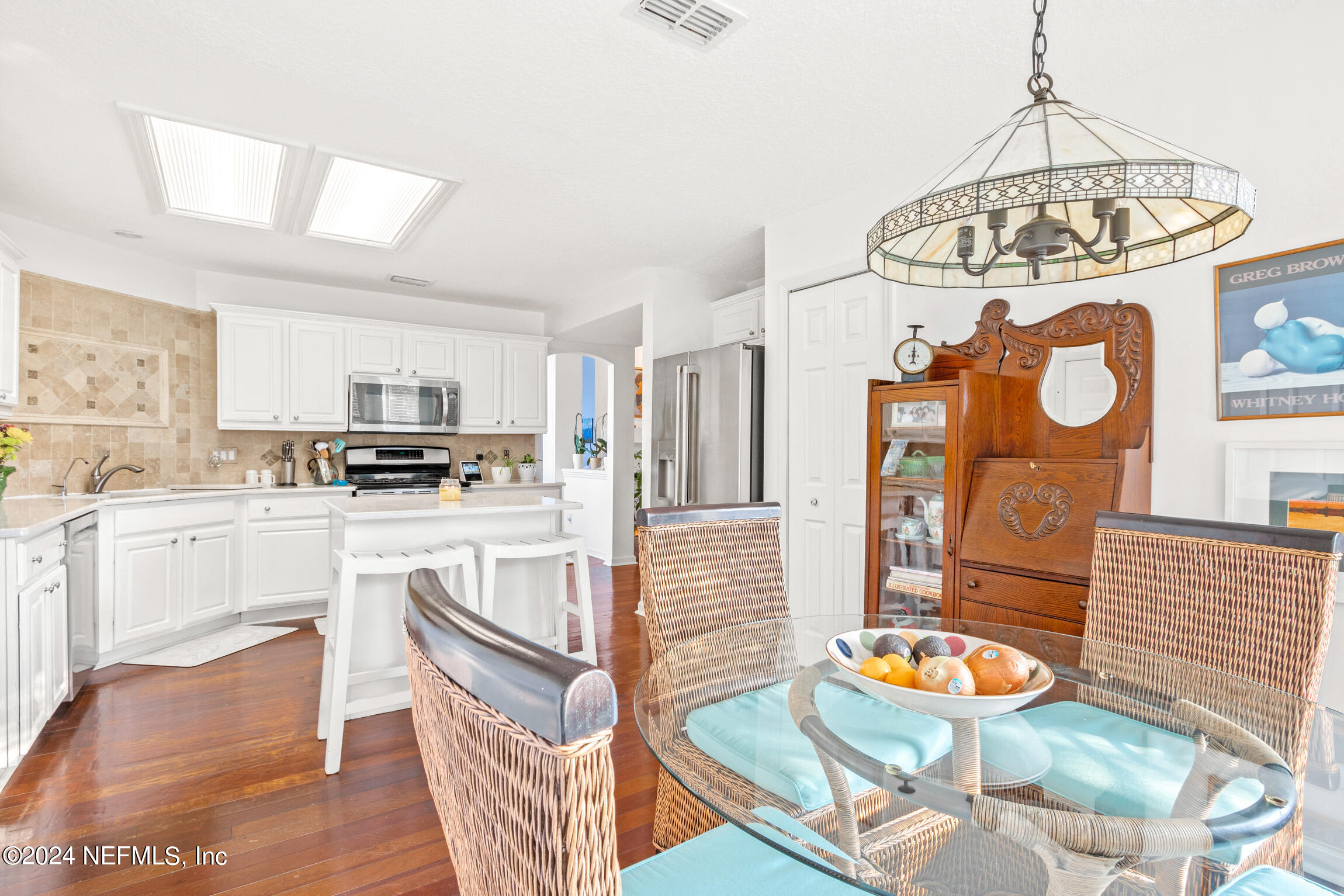137 South Beach Drive St. Augustine, FL 32084 - Photo 18 of 41 a kitchen with stainless steel appliances granite countertop a sink and cabinets