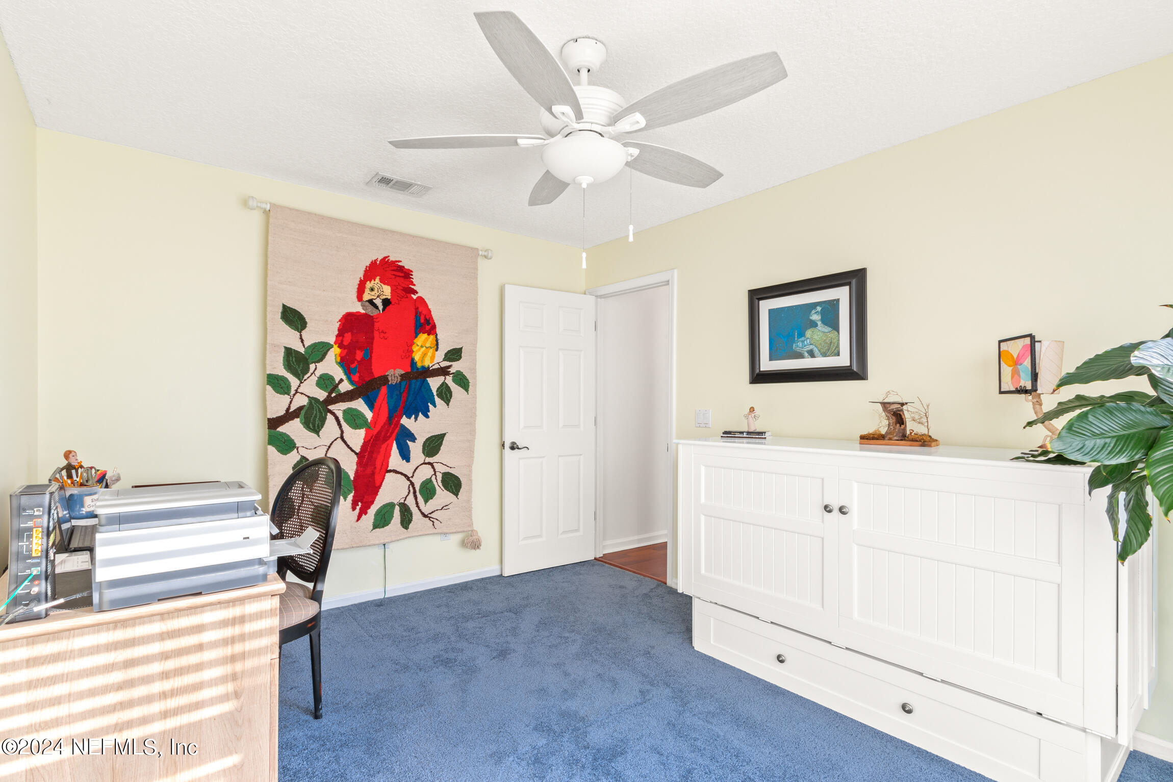 137 South Beach Drive St. Augustine, FL 32084 - Photo 20 of 41 a view of a entryway with furniture and chandelier
