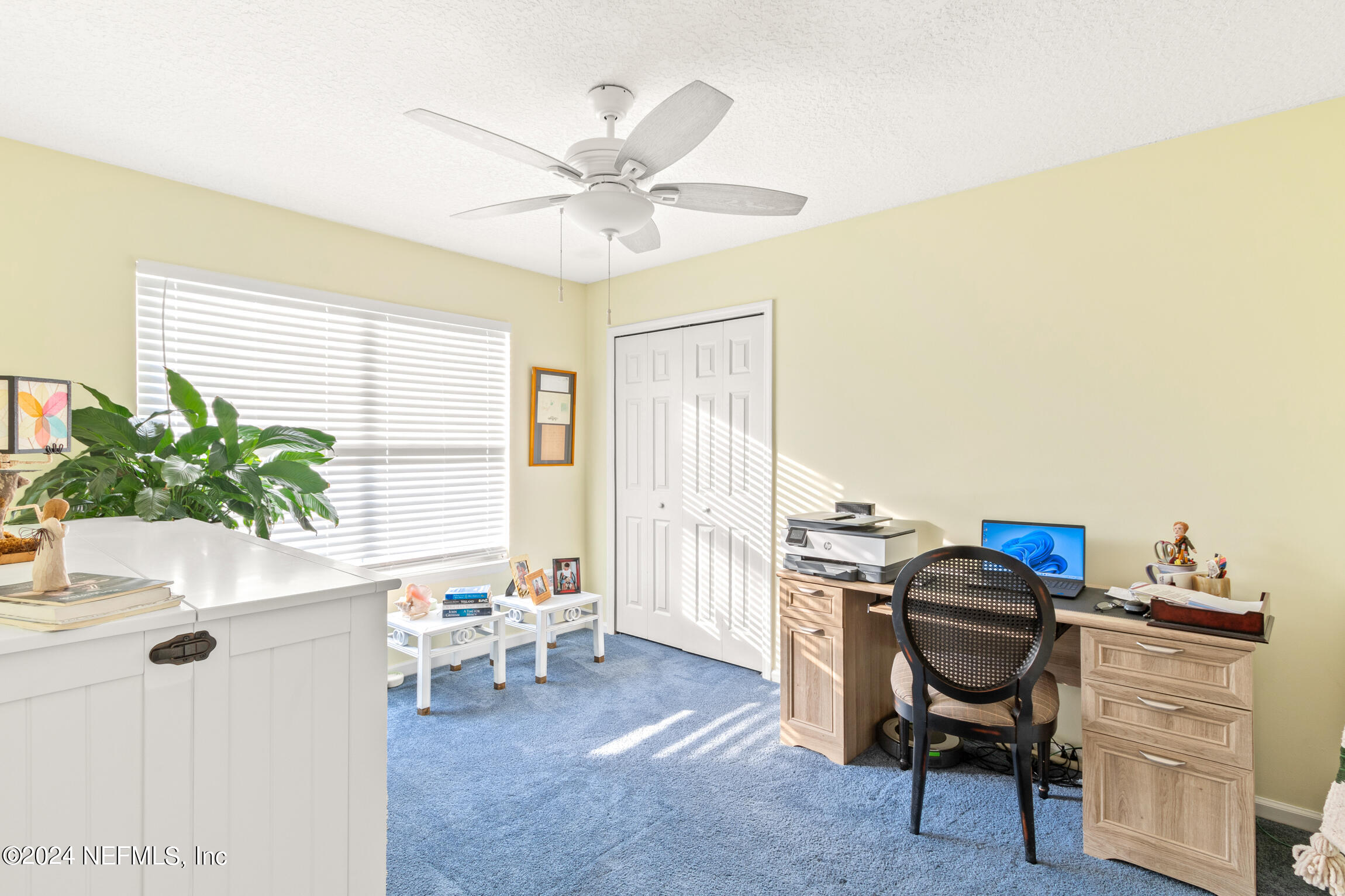 137 South Beach Drive St. Augustine, FL 32084 - Photo 24 of 41 a view of a workspace with furniture and a window