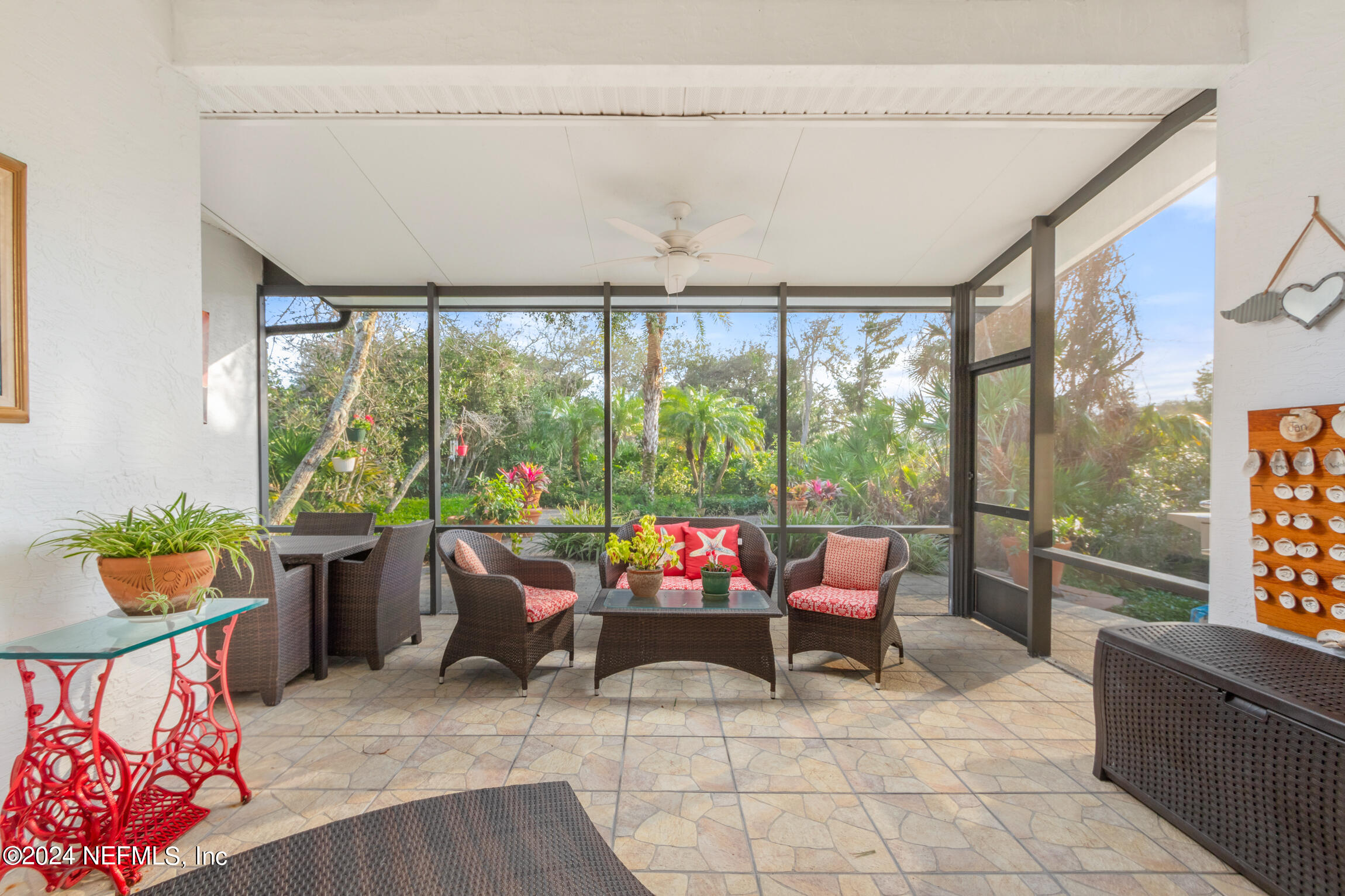 137 South Beach Drive St. Augustine, FL 32084 - Photo 25 of 41 a outdoor living space with furniture and garden view