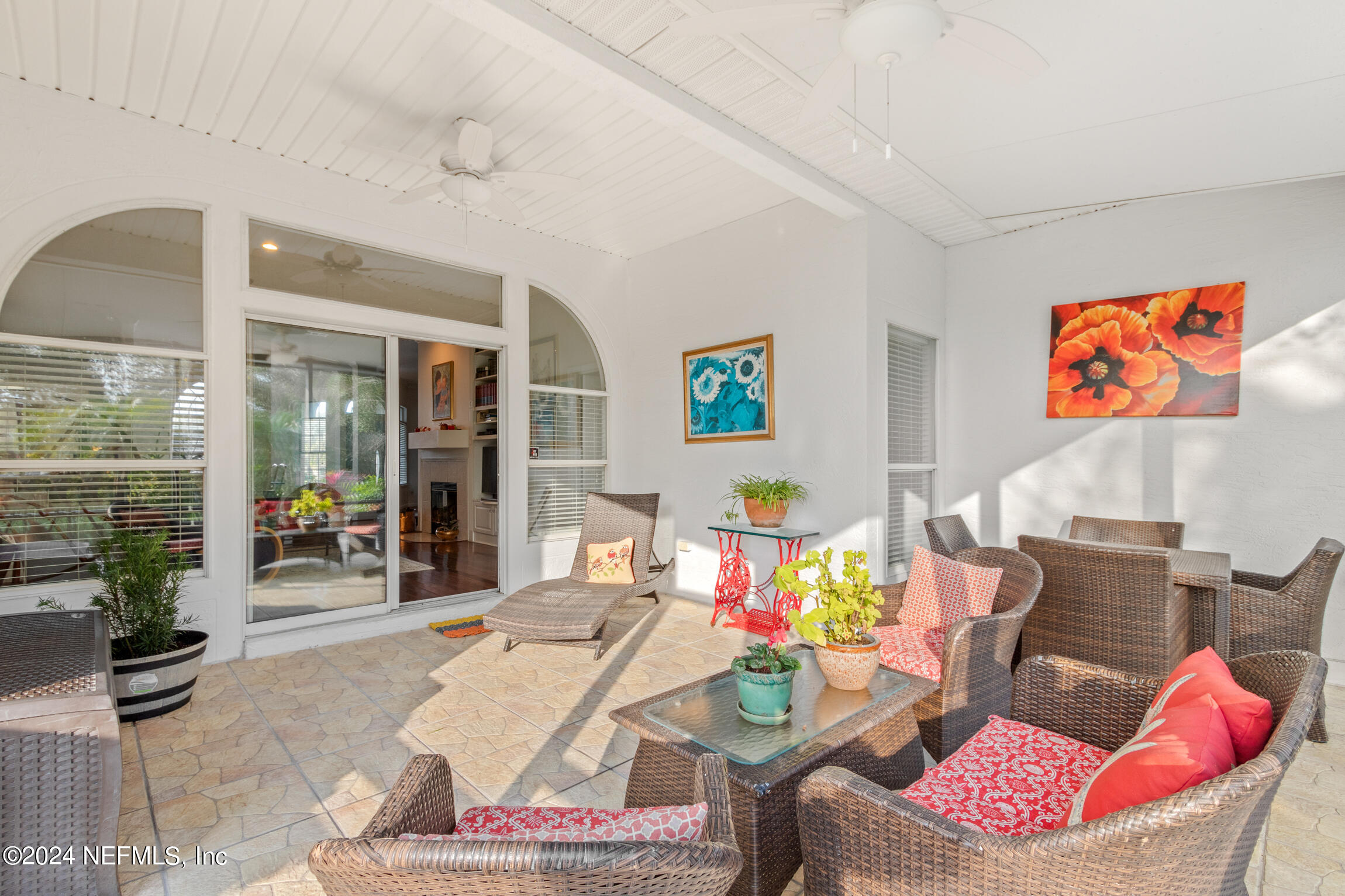 137 South Beach Drive St. Augustine, FL 32084 - Photo 26 of 41 a living room with furniture and a potted plant
