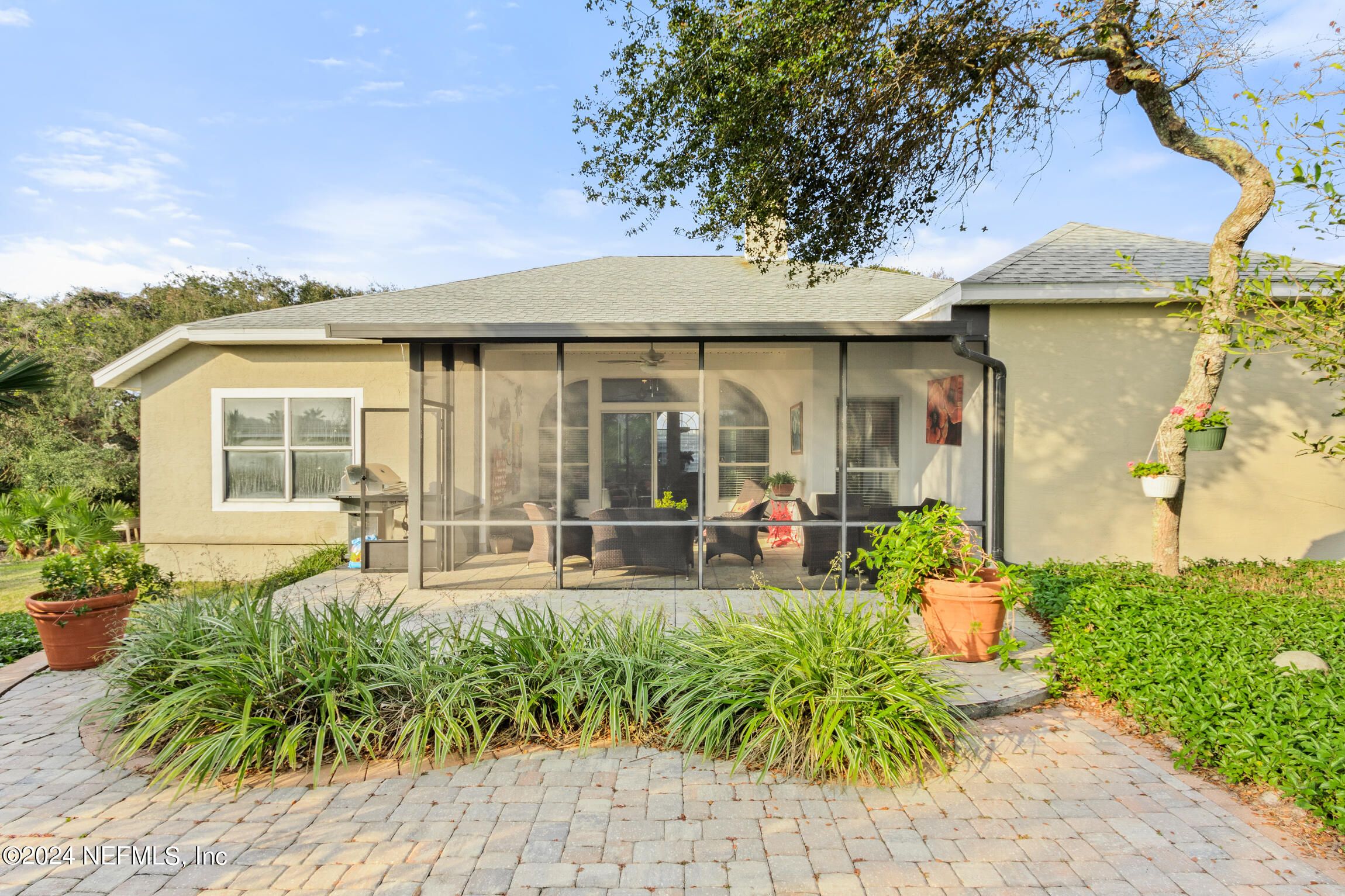 137 South Beach Drive St. Augustine, FL 32084 - Photo 29 of 41 a front view of house and yard with seating space