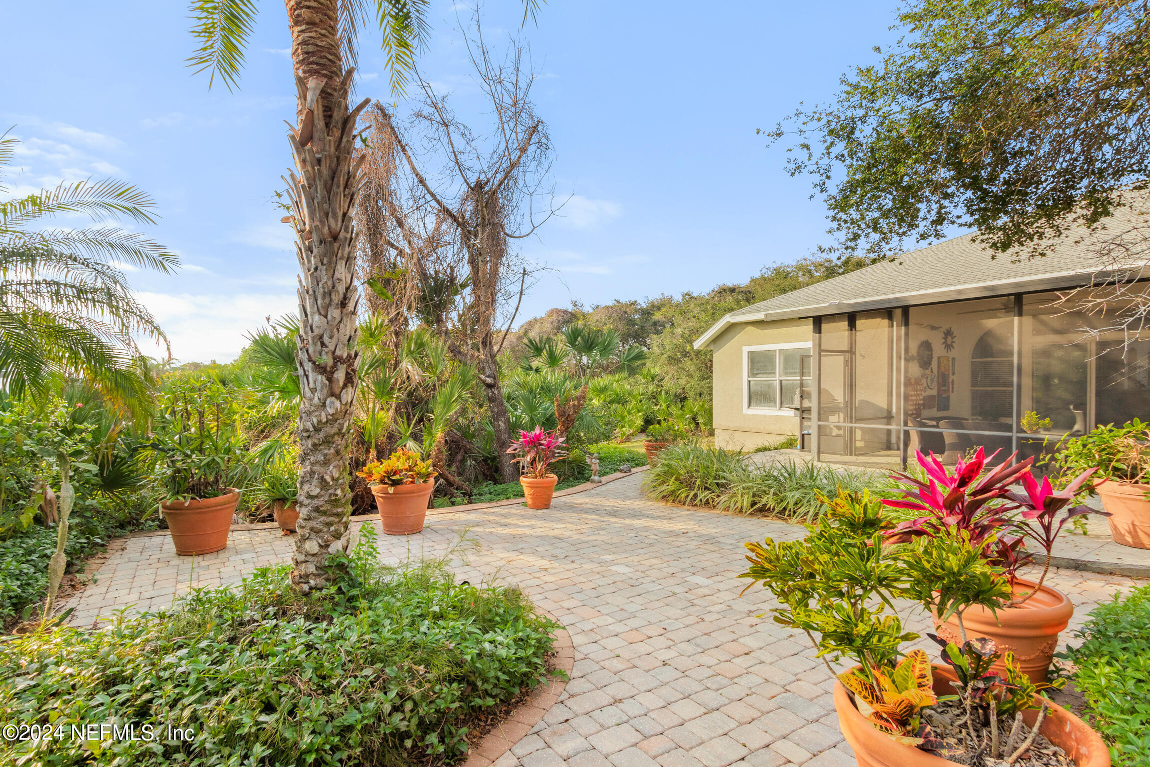 137 South Beach Drive St. Augustine, FL 32084 - Photo 30 of 41 a front view of a house with a yard