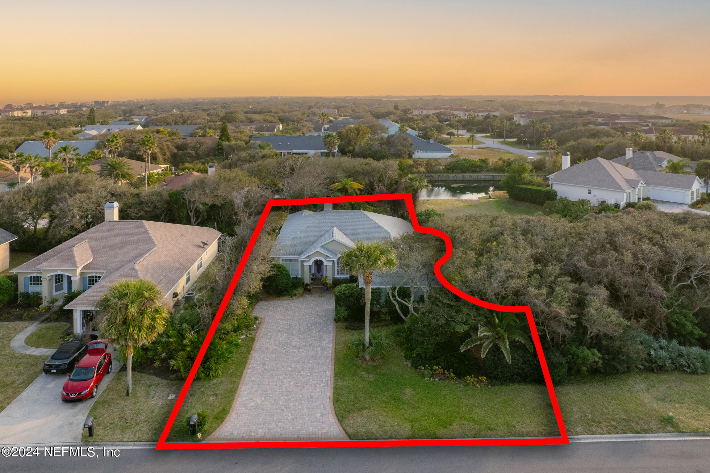 137 South Beach Drive St. Augustine, FL 32084 - Photo 33 of 41 an aerial view of multiple houses with a yard
