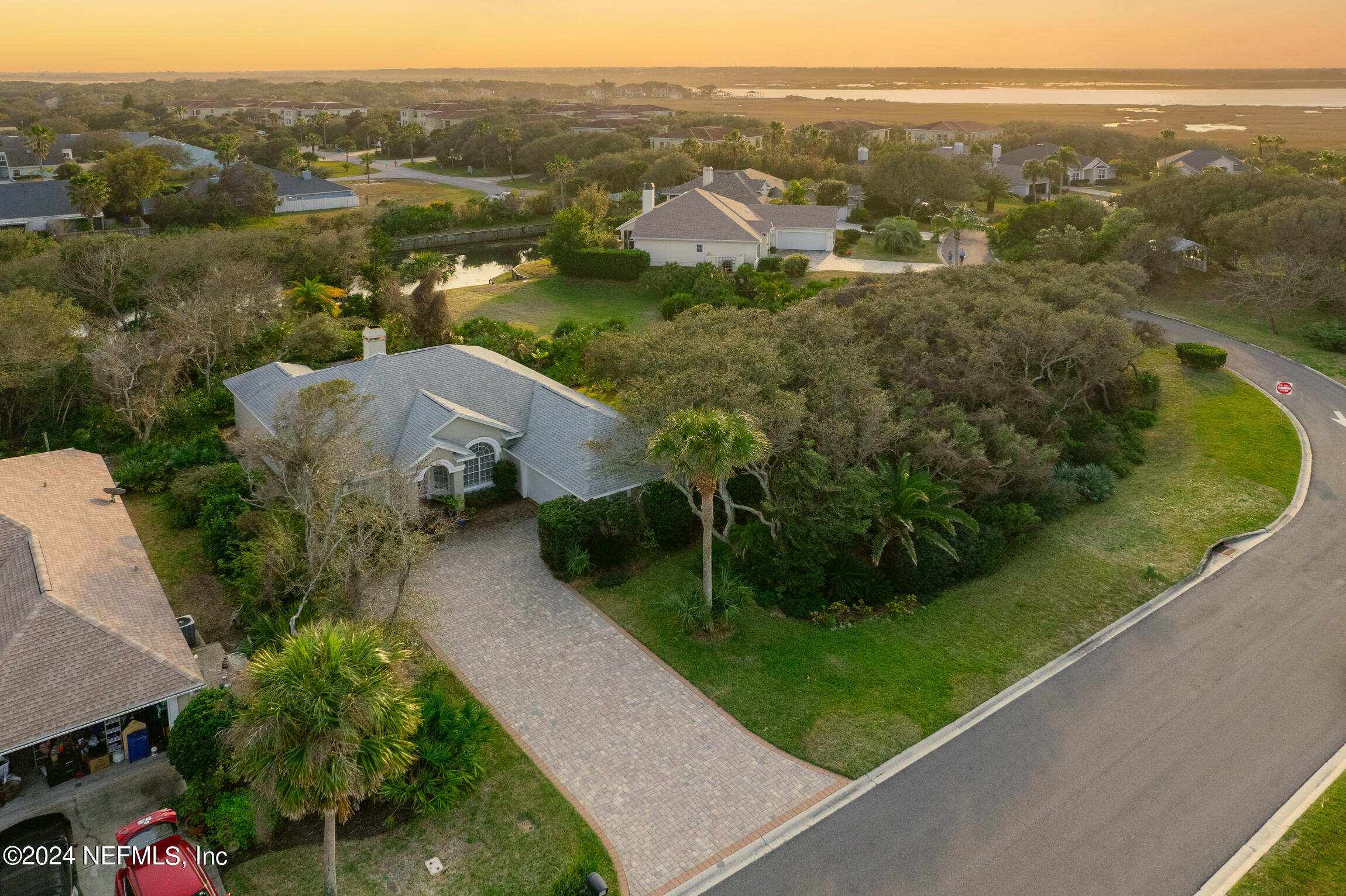 137 South Beach Drive St. Augustine, FL 32084 - Photo 35 of 41 an aerial view of residential houses with outdoor space and trees
