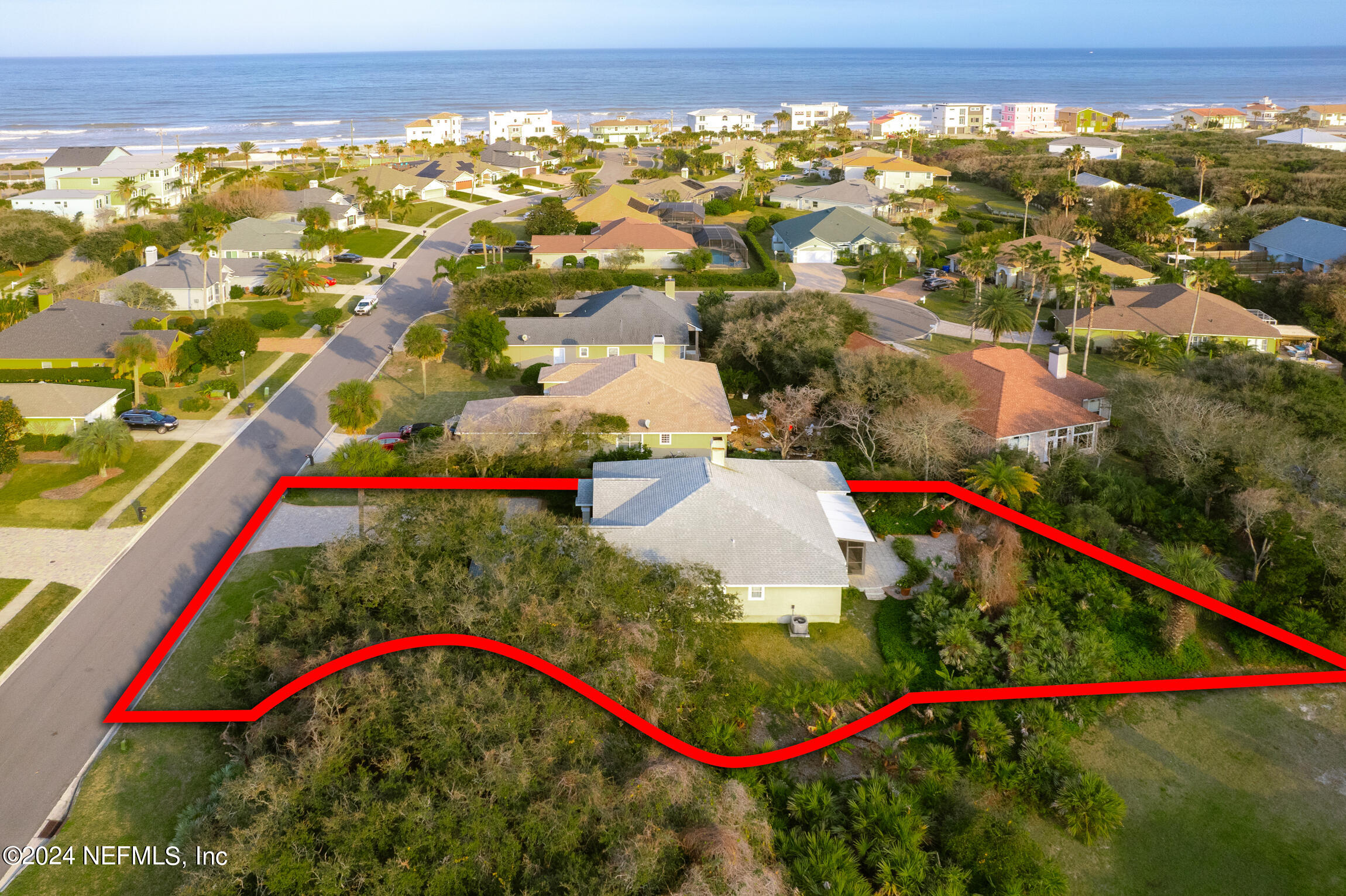 137 South Beach Drive St. Augustine, FL 32084 - Photo 40 of 41 an aerial view of residential houses with outdoor space and swimming pool