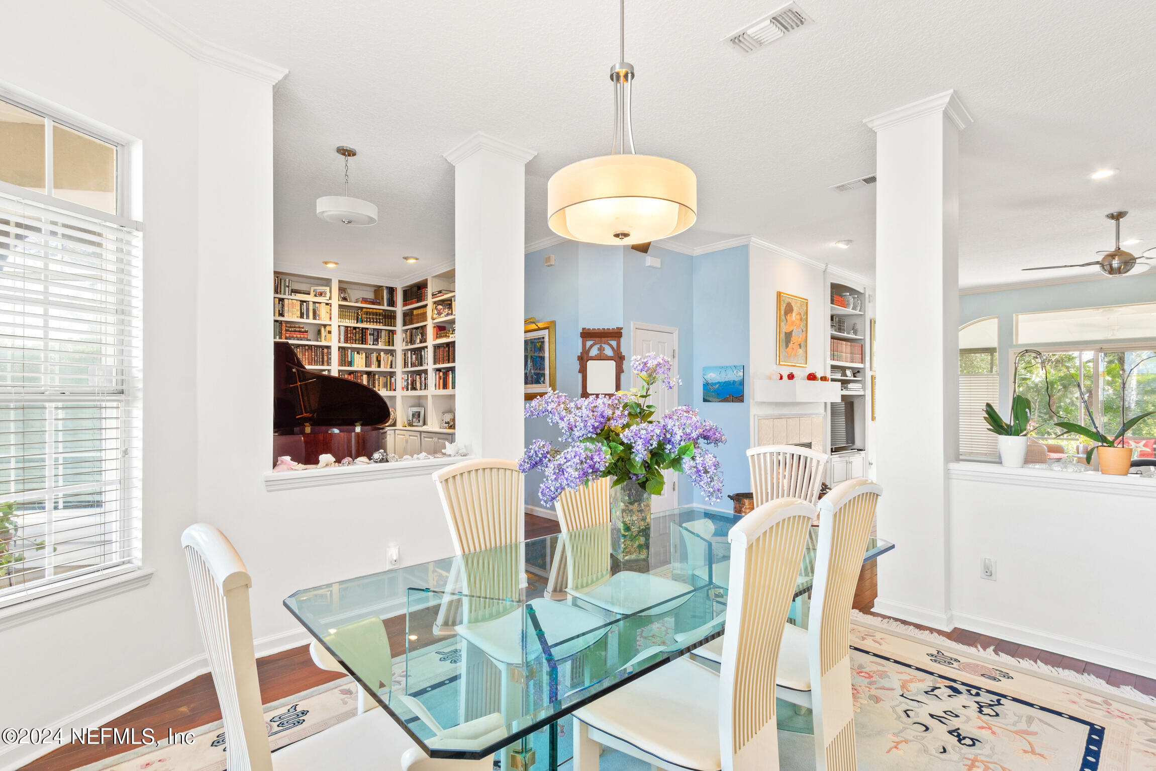 137 South Beach Drive St. Augustine, FL 32084 - Photo 4 of 41 a view of a dining room with furniture and a large window