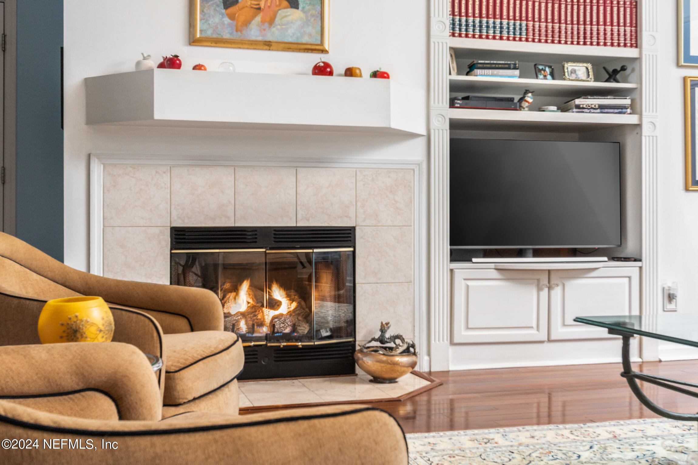 137 South Beach Drive St. Augustine, FL 32084 - Photo 9 of 41 a living room with furniture and a flat screen tv