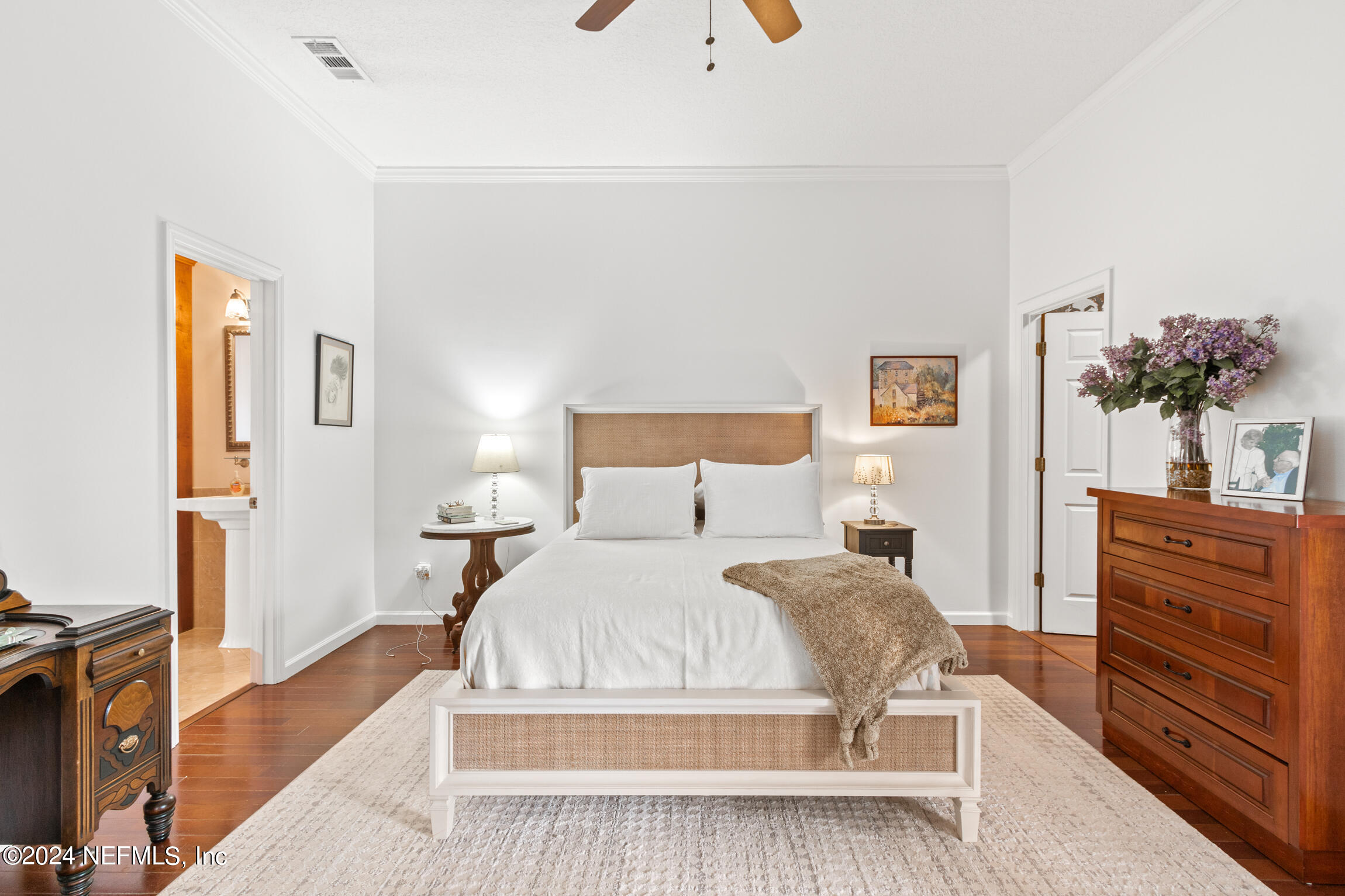 137 South Beach Drive St. Augustine, FL 32084 - Photo 10 of 41 a bedroom with a bed and a dresser