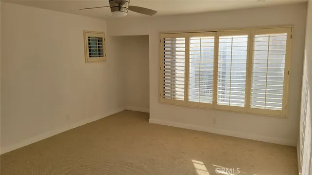 a kitchen with a refrigerator a stove a microwave and island