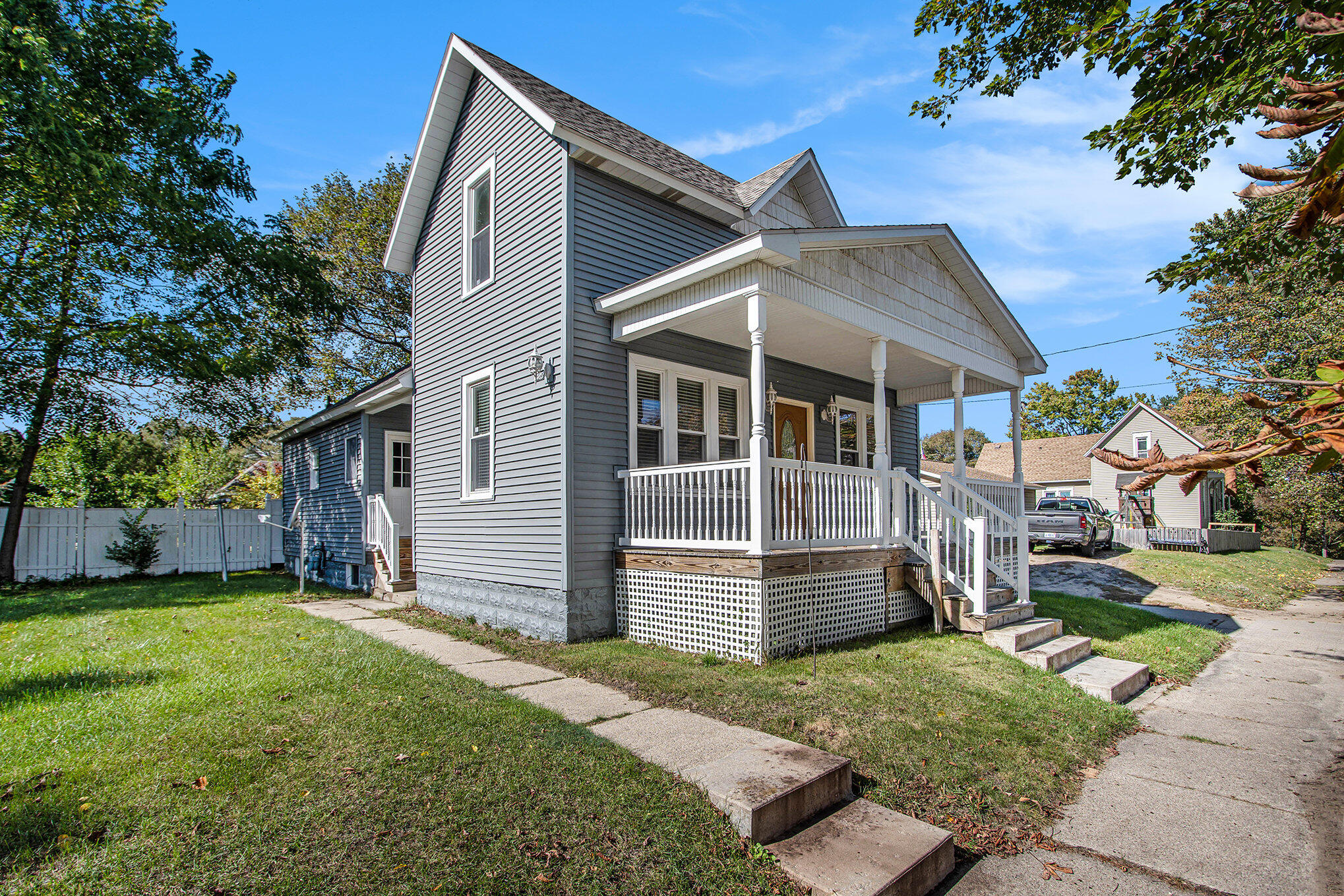 Undisclosed Address Manistee, MI 49660 - Photo 2 of 19 Charming Front Porch