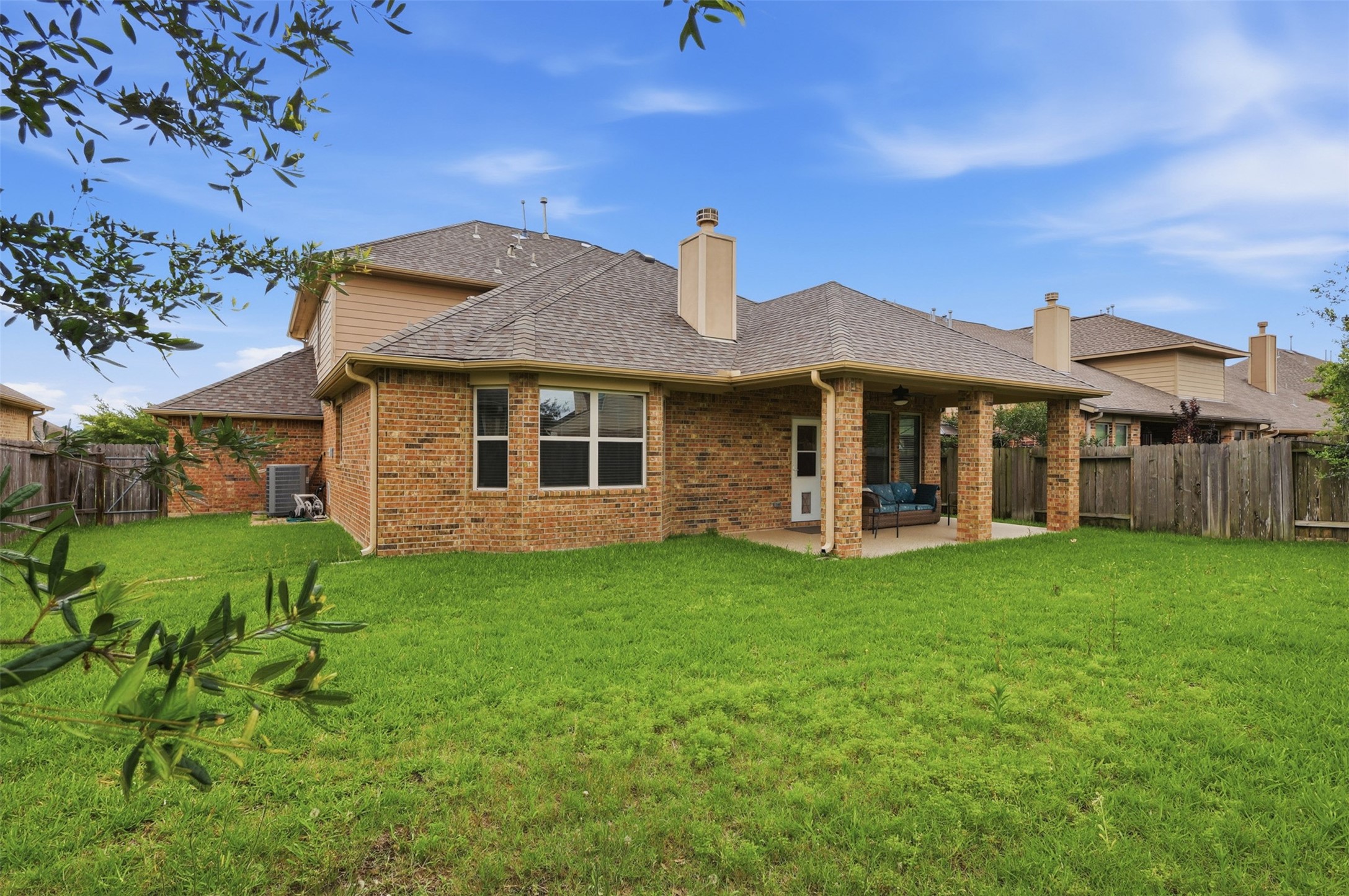 22943 Dale River Road Tomball, TX 77375 - Photo 29 of 29 a view of a house with a backyard