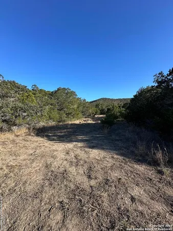 a view of mountain with lake view