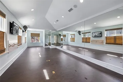 a view of a living room and kitchen with a large window