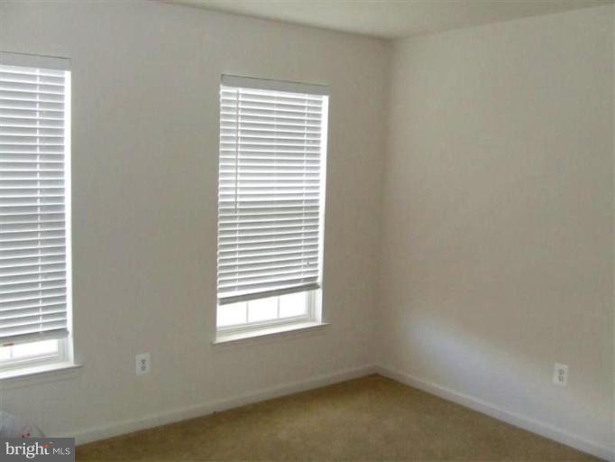 1307 Stallion Street Ranson, WV 25438 - Photo 15 of 22 an empty room with a window